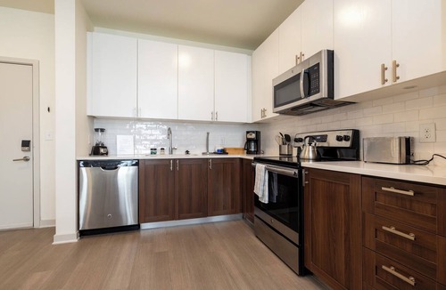 Downtown Louisville Apartment | Modern Nulu 2BR CozySuites 10