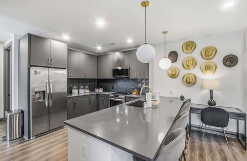 Rolling Mill Hill Condo | Muse | Modern condo in great downtown location with balcony & rooftop lounge
