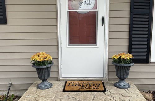 Liberty Cottage | Near Kansas City area cottage with a fire pit! Comfy beds and a stocked kitchen.