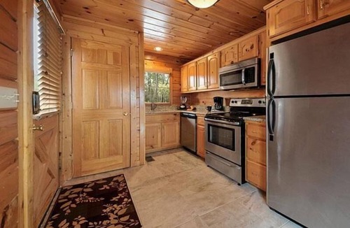 Sevierville Cabin | Nestled Inn: Breathtaking Mountain View - Brand New Hot Tub - Luxury Cabin