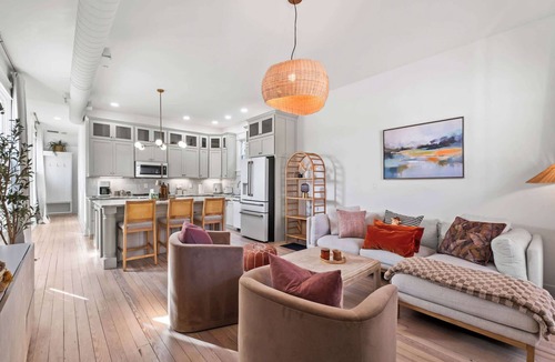 Schnitzelburg Apartment | NEW! Stylish Home w/Projector TV & Pvt Backyard!