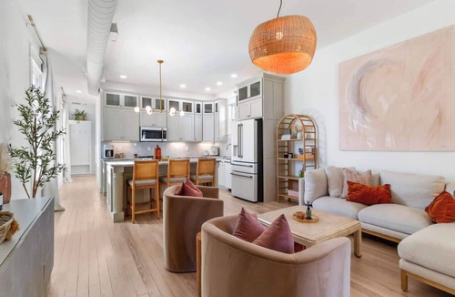 Schnitzelburg Apartment | NEW! Stylish Home w/Projector TV & Pvt Backyard!