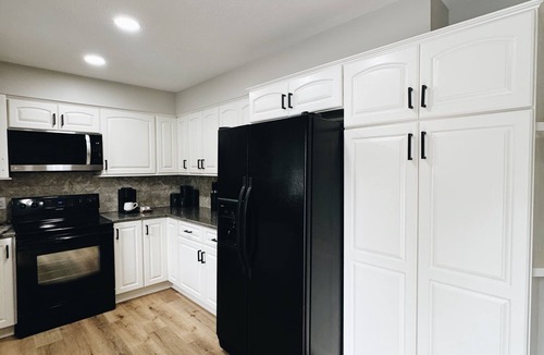 South Central Omaha House | Newly Renovated with heated Pool, close to CWS, sleeps 12