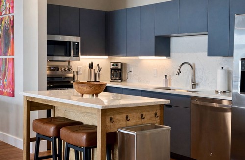 East Market District House | NuLu 6BR Penthouse | Hot Tub w/City Views | Kings