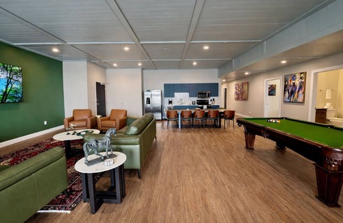 East Market District House | NuLu Skyline 5BR Penthouse and Rooftop Spa