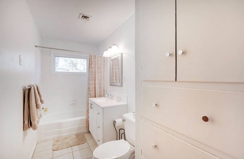 Wichita House | Peaceful 3-bedroom house in quiet neighborhood with mature trees.