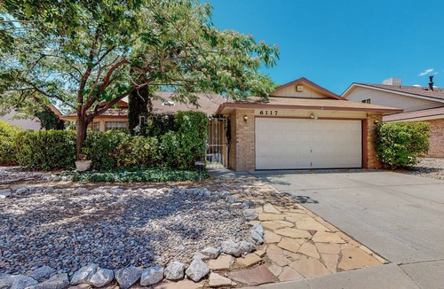 Taylor Ranch House | Piazza Di Coppice - A beautifully overgrown brick home!