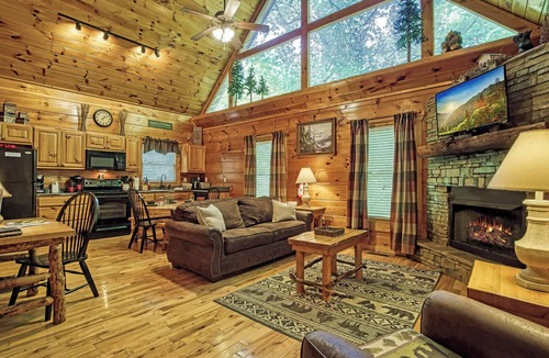 Sevierville Cabin | Private Wooded Setting! Theater Room! Centrally Located! 3 Decks! Fun Game Room