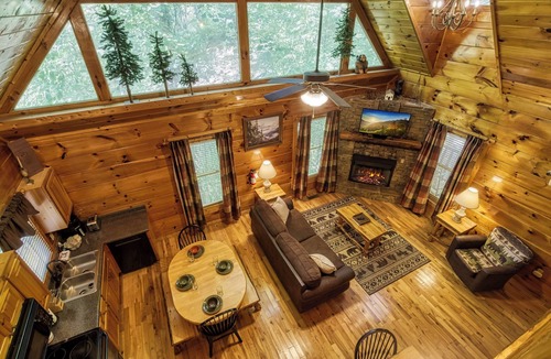 Sevierville Cabin | Private Wooded Setting! Theater Room! Centrally Located! 3 Decks! Fun Game Room