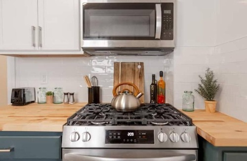 Turner Park House | Renovated Spacious Mansion near TU and Gathering Place. Pet/Family Friendly!