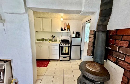 San Cristobal Cabin | Rural Log Cabin Rental for Couples near Taos Ski Valley
