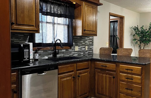 Wichita House | Rural setting on poultry farm with large home and outdoor space!