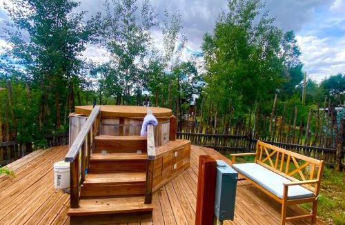 San Cristobal House | Rustic Log Cabin on Eco-Friendly Farm near Taos, New Mexico