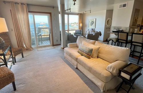 Ocracoke Condo | Selah By The Sea : Relax on the covered deck and enjoy the breezes