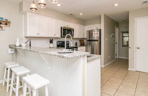 Surf City House | Shangri La - 2BR Turtle Cove Townhouse Near Pool