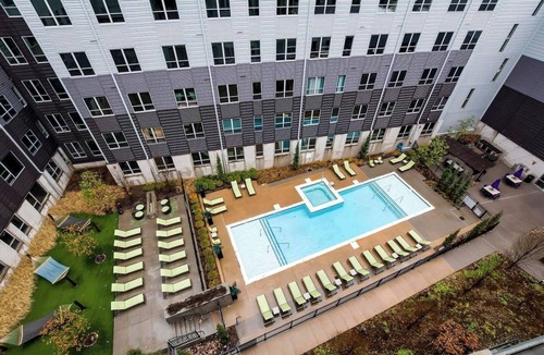 Downtown Louisville Apartment | Side-by-side King Bed Suites!