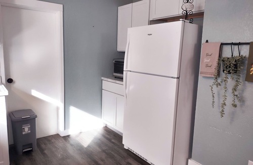 Bendena House | Spacious 4-bedroom house in pleasant Robinson with AC