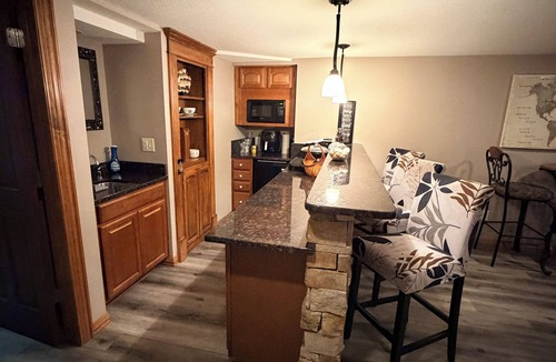 Wichita House | Spacious 4-bedroom house with Private Heated Pool, Outdoor Firepit and TV Oasis