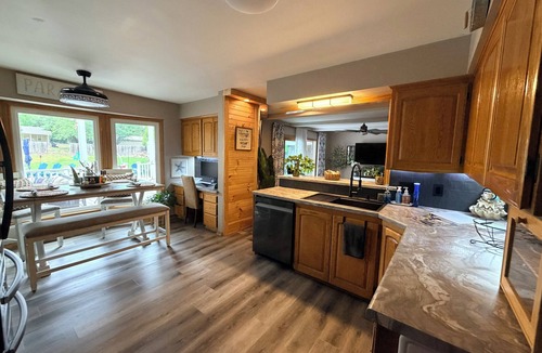 Wichita House | Spacious 4-bedroom house with Private Heated Pool, Outdoor Firepit and TV Oasis