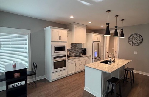 Buechel House | Spacious 4-bedroom townhome with 2 car garage in perfect Louisville location