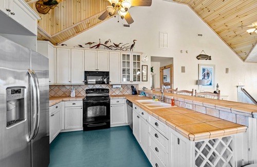 Hatteras House | Sprawling & luxe home with pool, hot tub, balconies, grill, game room, & AC