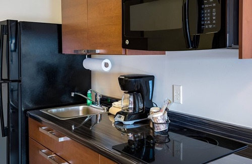 Council Bluffs Hotel | Stay Near Shops + Restaurants in Comfortable Studio w/Kitchen - Pet-Friendly