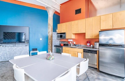 West Main Historic District Condo | Stunning Downtown Louisville Top Floor Corner Loft with Views