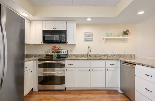 South Nags Head Condo | Stunning Top-Floor Oceanfront Condo! Pools & New Step in Shower and More!
