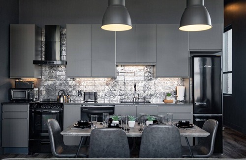 West Main Historic District Condo | Suite 7 City Loft Escape with River Views! By Hollyhock