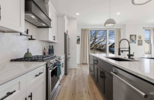 Hurwood Heights House | Summer rooftop hot tubs, sauna, game rooms near Geodis Park & Broadway