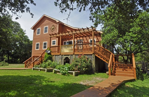 Ocracoke House | Sun-Inspired: Pet friendly, saltwater pool, large yard, screened porch.