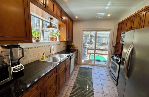 South Kansas City House | Sunny, safe, walkable house with King bed and AC
