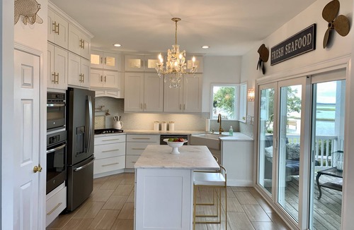 Emerald Isle House | Sunset, sunrise, golf cart, kayak, paddle board, launch, pet friendly & fenced.