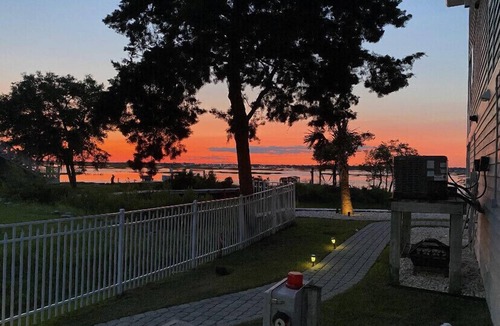 Emerald Isle House | Sunset, sunrise, golf cart, kayak, paddle board, launch, pet friendly & fenced.