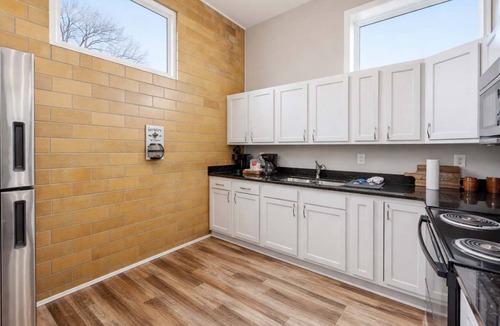 Taylor Berry House | The Booker Noe Suite | Brick Home w/Modern Design