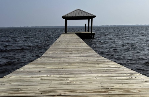 Belhaven House | The Light House -Waterfront Belhaven Home with dock, privacy & incredible views!