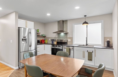 Sunset Hills House | The Lime & Leaf: Pet Friendly 2-bedroom house with AC in Lawrence, near KU