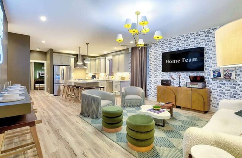 Katie Hill Neighborhood Apartment | The Modern Honkey: Rooftop Hot Tub | Sleeps 12!