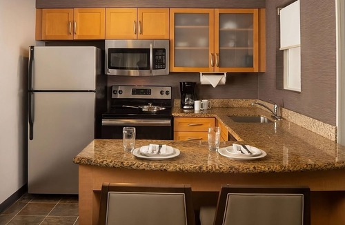 Brentwood Hotel | Time To Relax in Your Suite! Full Kitchen, Free Breakfast