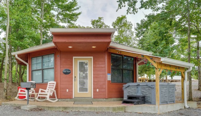 Cozy Bryant Vacation Rental Cabin w/ Hot Tub!