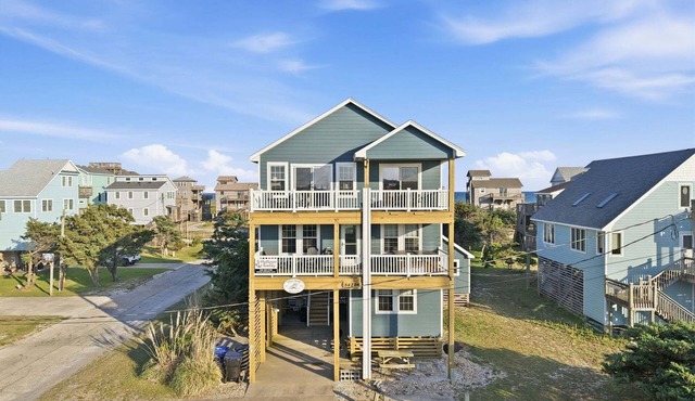 Dog-friendly home with hot tub, sunset sound view, & game room