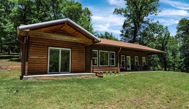 Enchanting Riverside Cabin Retreat with Mountain Views near Sardis Lake Oklahoma