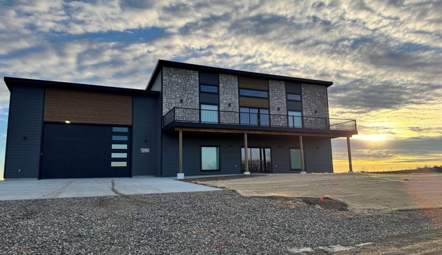 Fully furnished lake house with cozy spaces, full kitchen, and lake views.