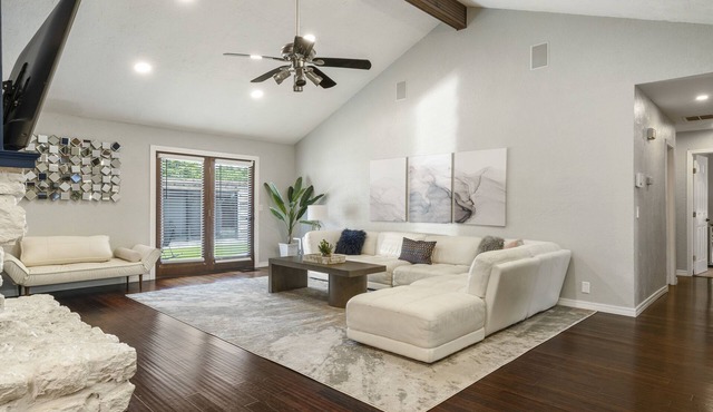 Modern space in south Tulsa w/outdoor firepit, kitchen, turf, & string lights!