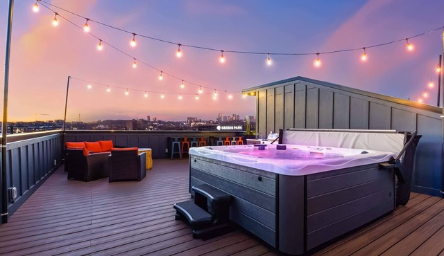 Summer rooftop hot tubs, skyline views, game zones near Broadway