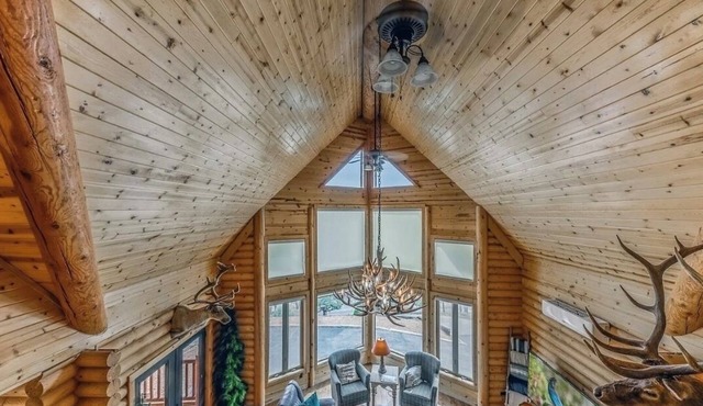 The Log Out Lodge, formerly Heaven's Peak, is a 5-bedroom cabin near Midtown